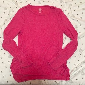 Girls pink long sleeve blouse with detailing on the sides